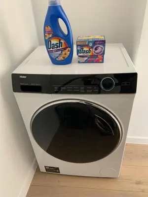 a microwave with a box of cereal and a pair of scissors at #2800ourhome 201 in Mechelen