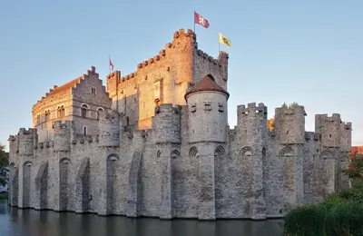 a castle in the middle of the water at Cozy city centre room with parkview in Ghent