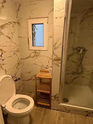 a bathroom with a toilet and a shower at Studio n1 Bruxelles Centre Ville in Brussels