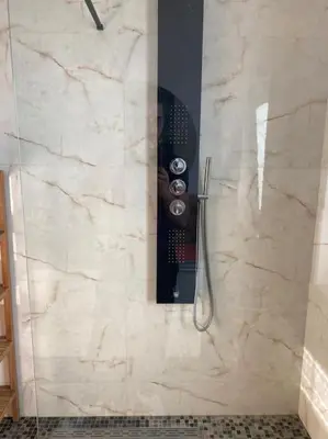 a shower in a bathroom with a glass shower at Apartment Antwerp City center #003 in Antwerp