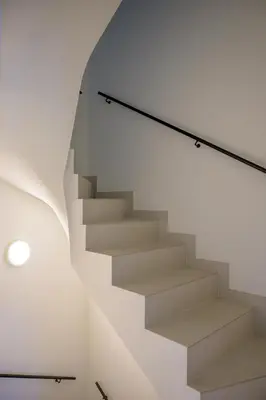 a staircase in a house with a glass wall at SHWAY - The Printing Press in Antwerp