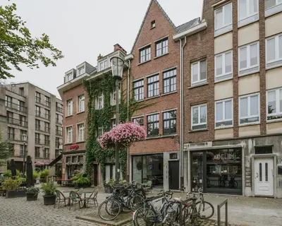a group of bikes parked in front of a building at SHWAY - The Proof Reader in Antwerp