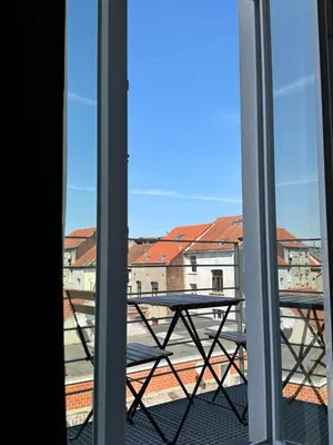a view from the window of a balcony at Loft Luna Brussels Midi in Brussels