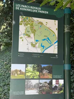 a sign on a pole with a map at Bruxelles Cozy Atomium Expo in Brussels