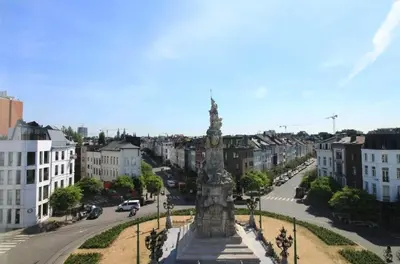 a large monument in the middle of a city at Modern Stay in Antwerp in Antwerp