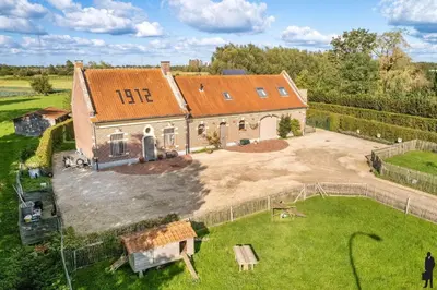 an aerial view of a large house with a yard at Klavertje Lier Schapenstal in Lier