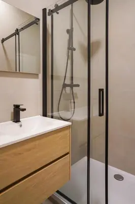 a bathroom with a sink and a shower at Appartment Janson 5 in Brussels