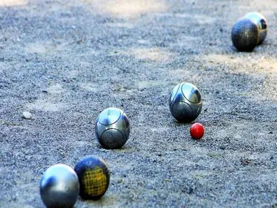 a group of soccer balls on the ground at Stay with Beach and Minigolf Views in Ravels