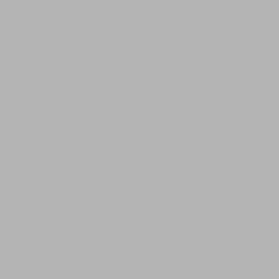 a woman sitting on the edge of a sauna at Thermae Grimbergen Hotel in Grimbergen