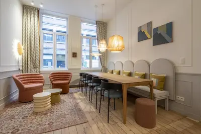 a dining room with a table and chairs at SHWAY - Le Lambermont in Antwerp